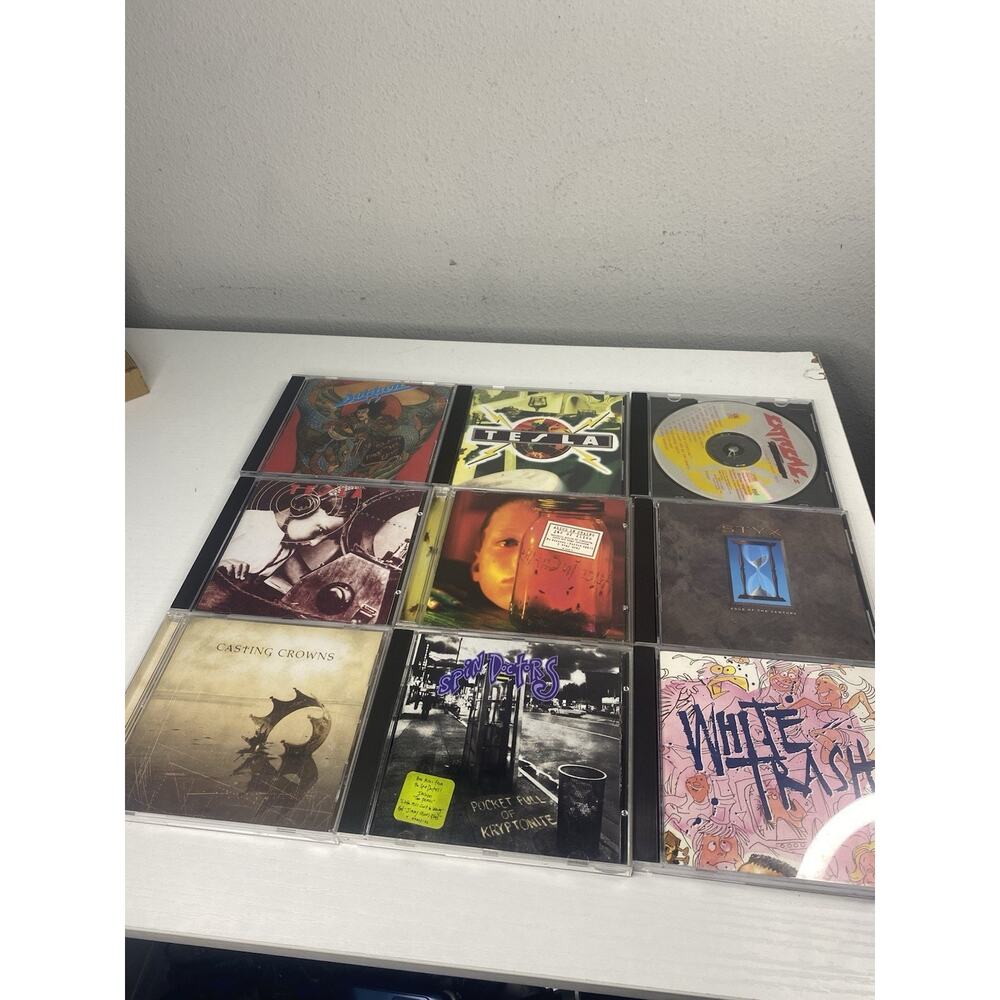 Lot of 9 rock & roll cds Tesla Spin Doctors Casting Crowns & More